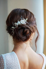 Close-up of a beautyful wedding hairstyle with hair decoration