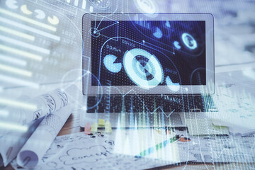 double exposure of desktop computer and technology theme hologram. concept of software development.
