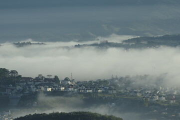 Wall Mural - town of the fog with magic light and tranquility scenery