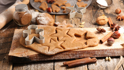 Wall Mural - cooking christmas gingerbread cookies with spices