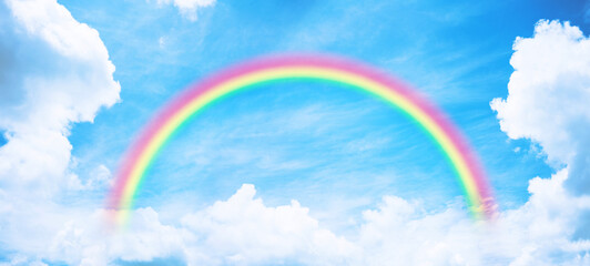 Wall Mural - rainbow in blue sky.