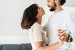 © Drobot Dean - Image of romantic joyful couple smiling and hugging while dancing