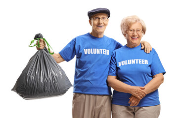 Poster - Elderly volunteers with a plastic rubbish bag smiling at the camera