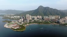 Aerial View Of Hong Kong Wu Kai Sha Area With Modern Residential Building Complex And Tolo Harbour Open Bay