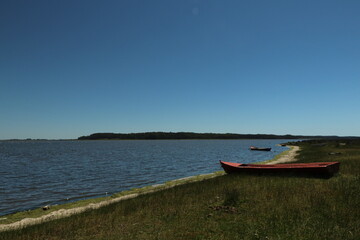 Small boats anchored in the lagoon waters