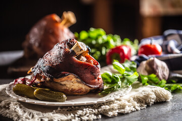 Wall Mural - Smoked pork ham hock, pork knee served with pickled cucumbers and herbs