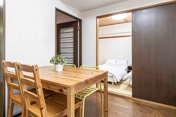 Brown wood dining table in the living room of an old Japanese-style house