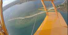 An Aerial View From A Vintage Tiger Moth Aircraft Of The Swan River, Point Walter And The City Of Perth, Western Australia