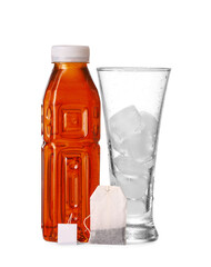 Bottle of fresh tea and glass with ice on white background