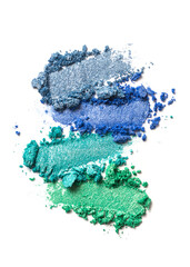 Wall Mural - Close-up of make-up swatches. Smears of crushed shiny blue, green and turquoise eye shadow