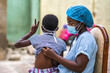 © Daniel Buah/Wirestock - Closeup shot of a boy getting a checkup by a doctor
