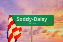 Soddy-Daisy - Tennessee/USA. Road Or City Sign. Flag Of The United States. Sunset Sky.