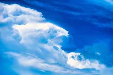 Blur white heap cloud sunshine in summer blue sky soft cloud background