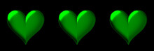 Three Big Shiny Green Hearts On Black Background, St. Patrick's Day Or Valentine's Day Card