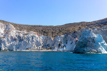 Panoramic View Of White Beach, Akrotiri, Santorini, Cyclades, Greece. Shot From Sailing Boat. Blue Sea And Blue Sky