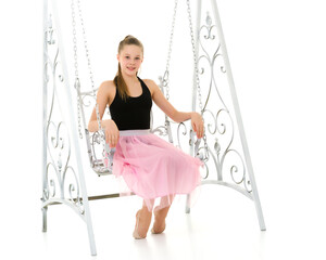 Wall Mural - Portrait of Beautiful Teenage Girl Sitting on Elegant Metal Swing.