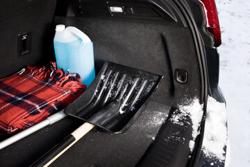 winter driving safety - an emergency snow shovel in the trunk