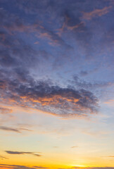 sunset in the evening sky on dusk vertical