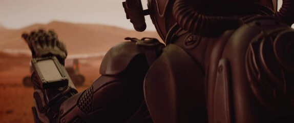 Wall Mural - handheld tracking back view of astronaut wearing space suit walking on a surface of a red planet. ma