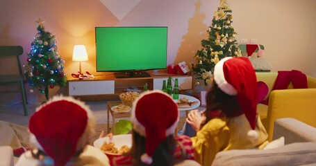 Wall Mural - women watch TV while Christmas