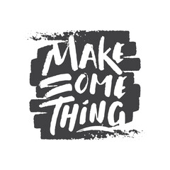 Hand drawn lettering of Make Something on black textured background.