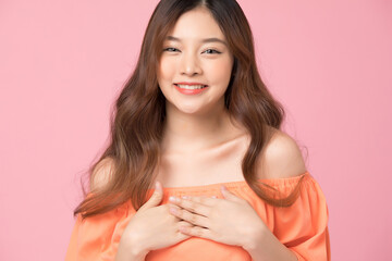 Portrait of  beautiful woman posing gesture isolated on pink studio background