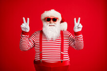 Portrait Of His He Nice Attractive Handsome Cheerful Cheery Optimistic Santa Showing Double V-sign Having Fun Party Good Mood Isolated On Bright Vivid Shine Vibrant Red Color Background