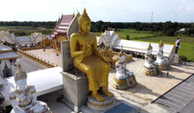 Big Buddha Statue And Temple At Wat Nong Pong Nok - Aerial View.