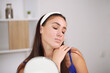 © ostap_davydiak - Beautiful girl with natural make-up at home Beauty and skin care concept