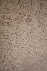 Architecture and design. Closeup view of brown exterior wall covering. 