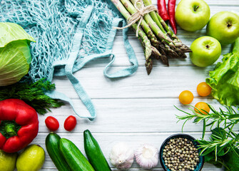 Fresh vegetables and fruits with a string bag