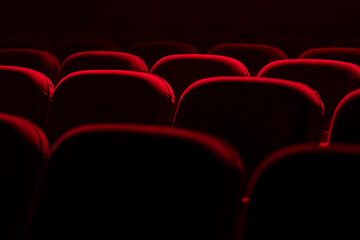 Empty cinema hall with red seats. Movie theatre