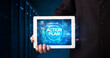 © ra2 studio - Young business person working on tablet and shows the inscription: ACTION PLAN, business concept