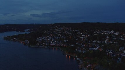 Wall Mural - The Norwegian town Drobak on a late night