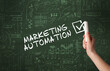 © ra2 studio - Hand drawing MARKETING AUTOMATION inscription with white chalk on blackboard, new business concept