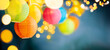 Festive background with colorful lights garland and bright bokeh. Holiday light decor. Celebration concept.