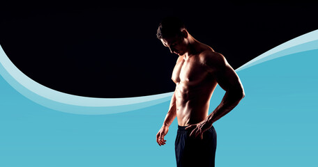 Wall Mural - Strong, fit and sporty bodybuilder man over black background.