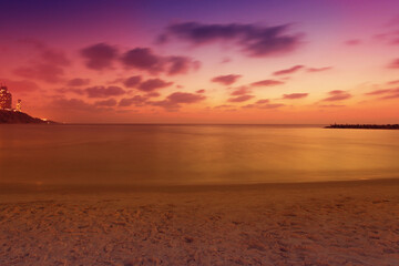 Fototapete - Seascape. Beach in the evening. Netanya city during sunset, Israel