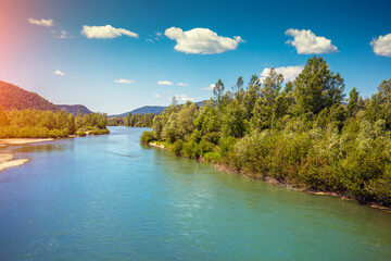 Wall Mural - View of mountain valley and river.  Springtime. Tisza (Tysa, Tisa) river. Khust, Zakarpattia Oblast Ukraine, Europe