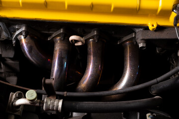 car maintenance series: closeup of exhaust header