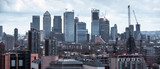Fototapeta Londyn - City of London  East side, Canary Wharf skyscrapers panoramic view. Office buildings, banks, international financial district. London, UK