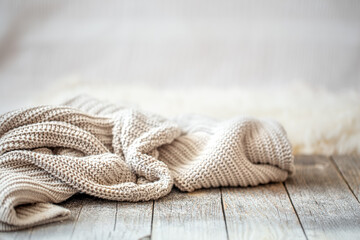 Wall Mural - Background with a cozy knitted sweater, space for text.