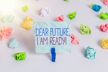 Wall Mural - Handwriting text Dear Future I Am Ready. Conceptual photo Confident to move ahead or to face the future Colored crumpled papers empty reminder white floor background clothespin