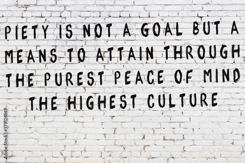 Fotomural Painted black mindful inscription on white brick wall background