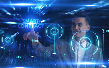 Business, Technology, Internet and network concept. Young businessman working on a virtual screen of the future and sees the inscription: Smart contract