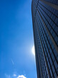 Very high Montparnasse tower in Paris under blue sky