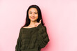 © Asier - Young chinese woman isolated on a pink background smiling and raising thumb up