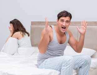 Family conflict with wife and husband in bed