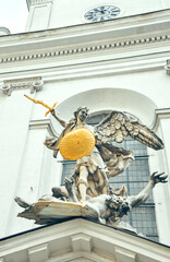 Wall Mural - Wien, Austria - Archangel Michael Statue at St. Michael's Church