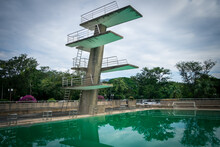 View Of Diving Board On Blue Sky At Thailand. This Photo Can Be Used For Sport Concept. Public Plunge Pool.